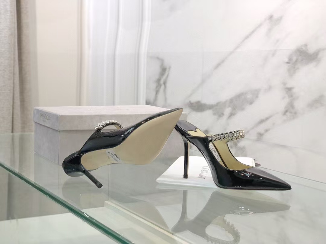 ua Ji*y Ch* mules en cuir bing
