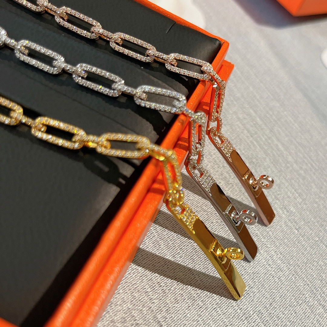 hermès fully Di*m*nd-encrusted kelly bracelet