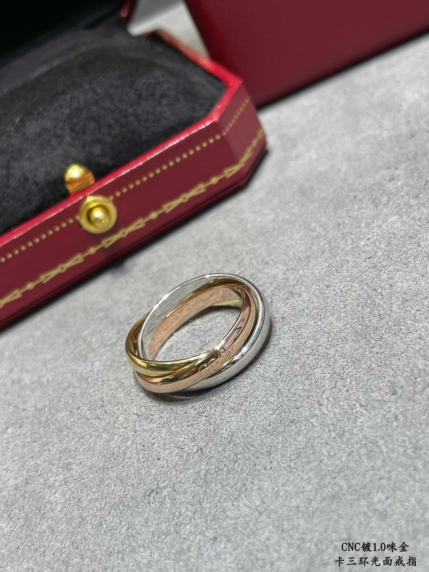 Ca*t*er three-ring polished ring