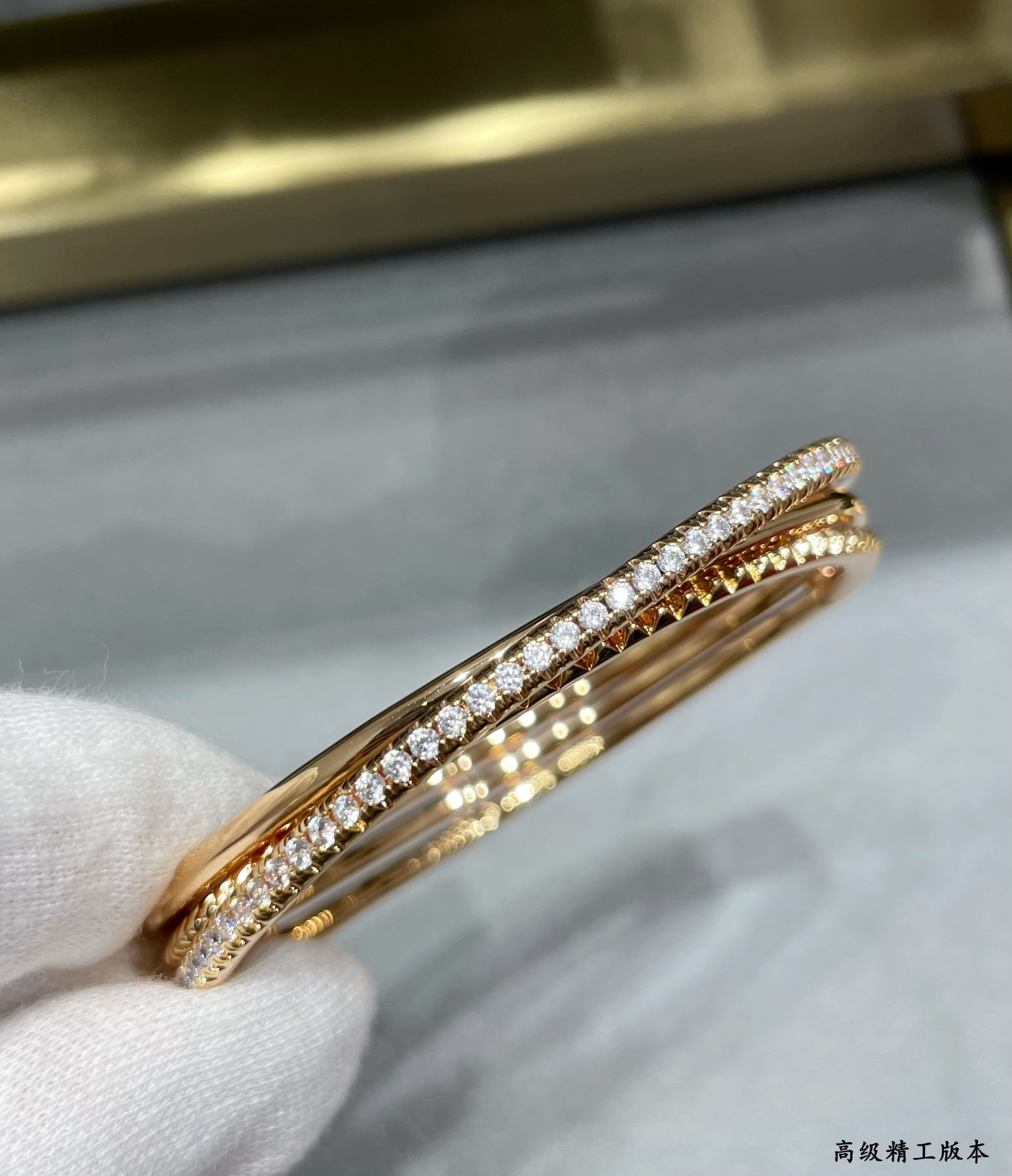 Ca*t*er three-ring rivet bracelet