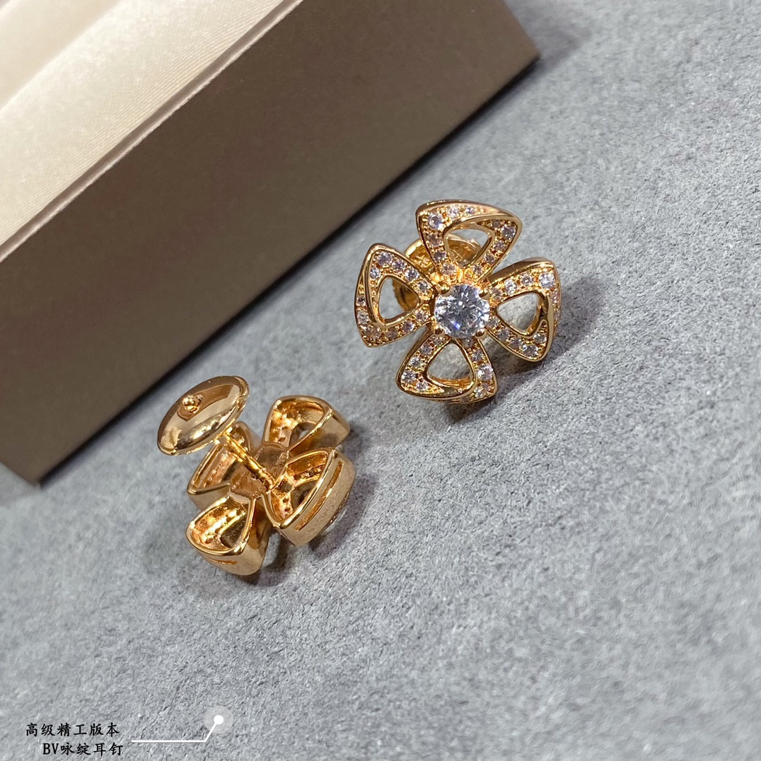 B*l*ai earrings