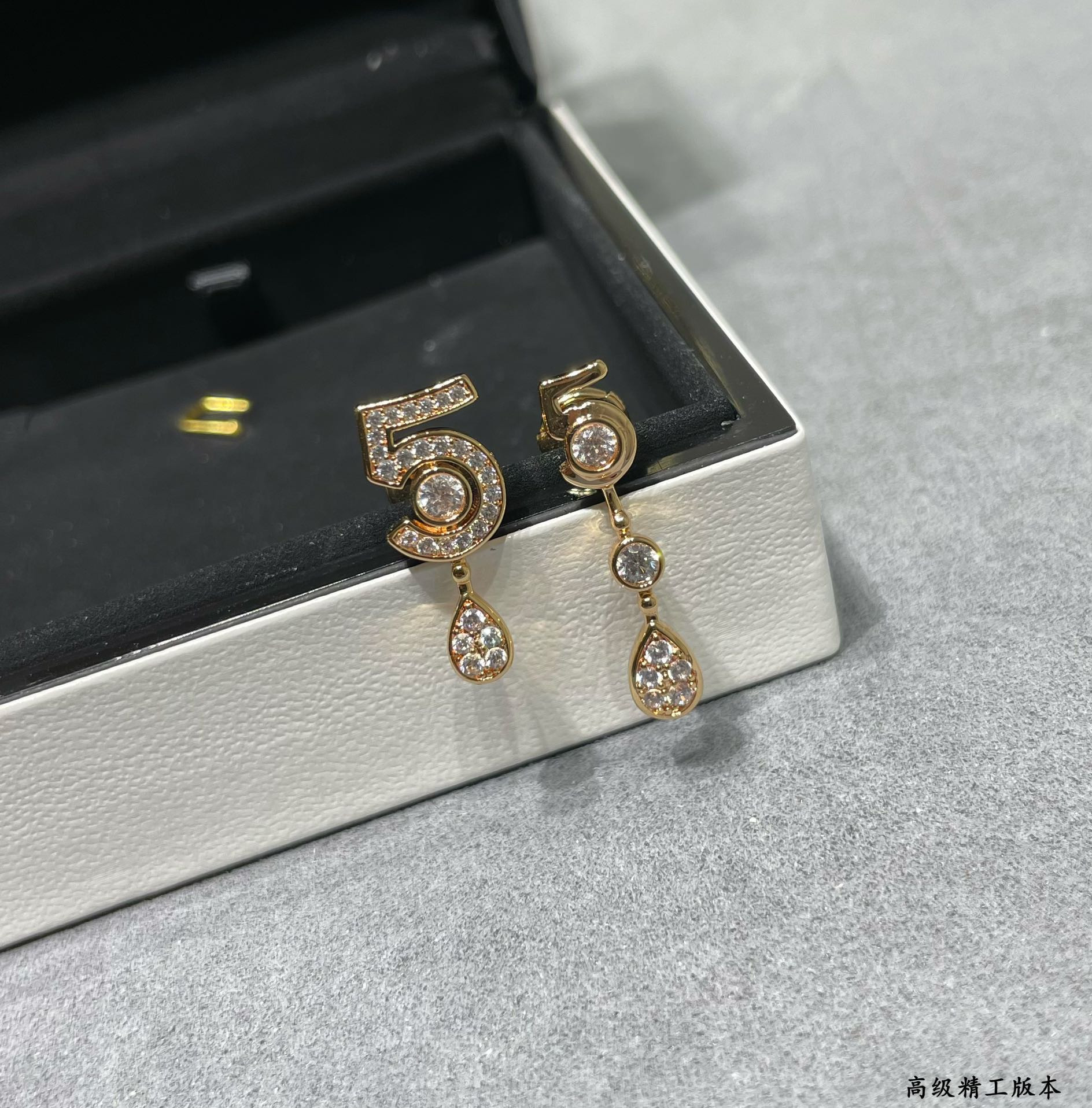 Ch*el 5-word earrings