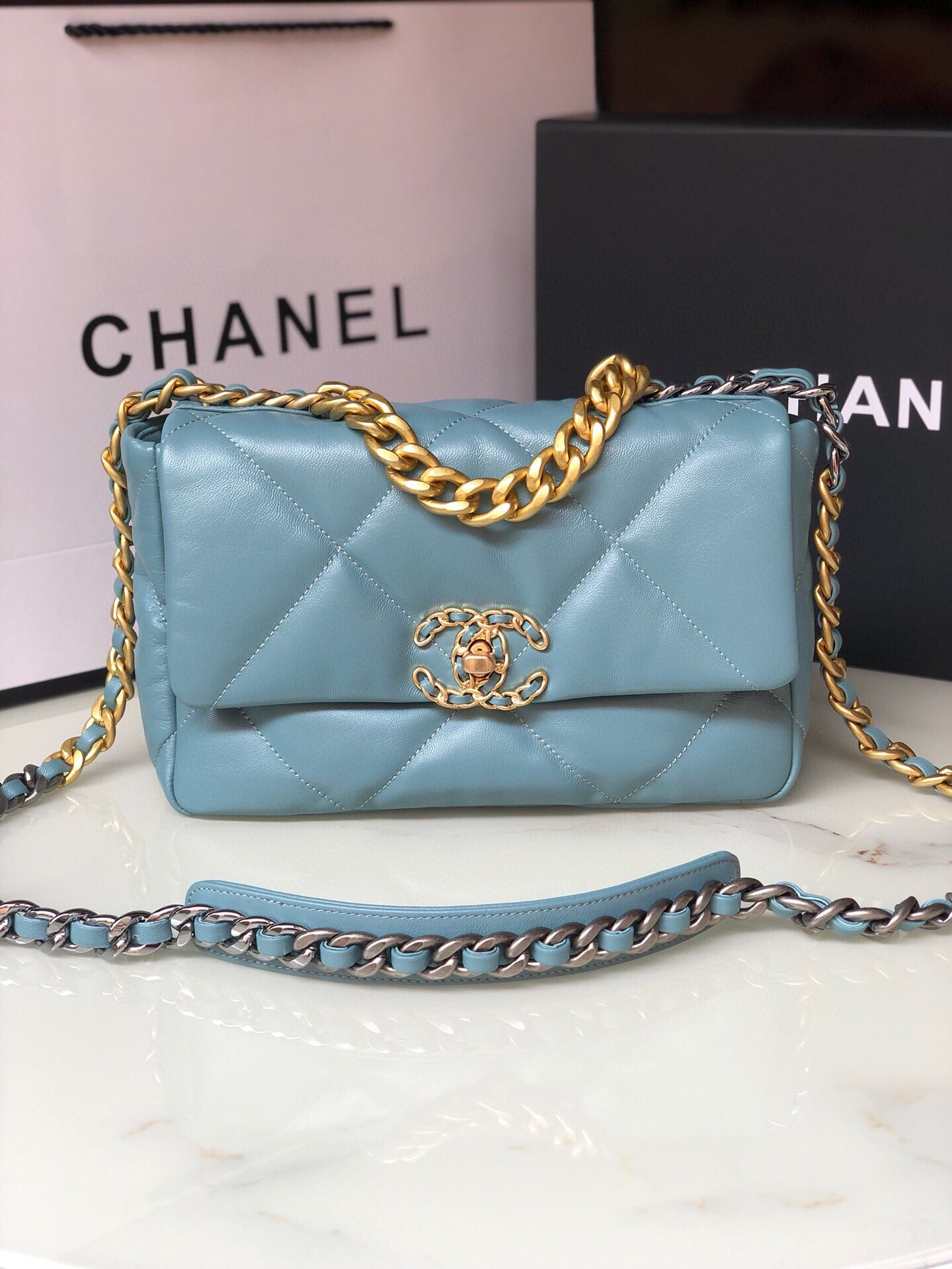 Ch*el 19 handbag shiny leather, gold-tone, silver-tone & ruthenium-finish metal blue 6.2 × 10.1 × 3.5 in