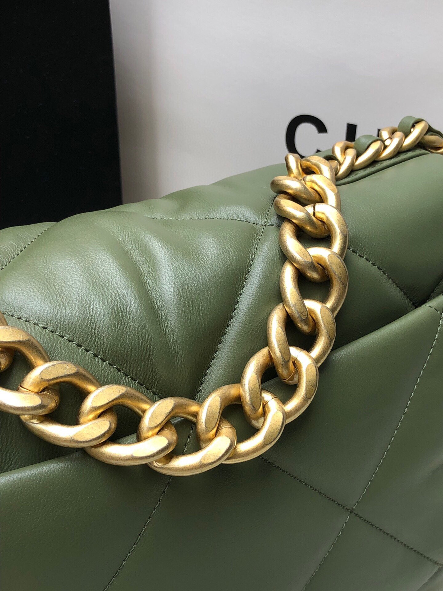 Ch*el 19 large handbag shiny leather, gold-tone, silver-tone & ruthenium-finish metal dark green 7.8 × 11.7 × 3.9 in