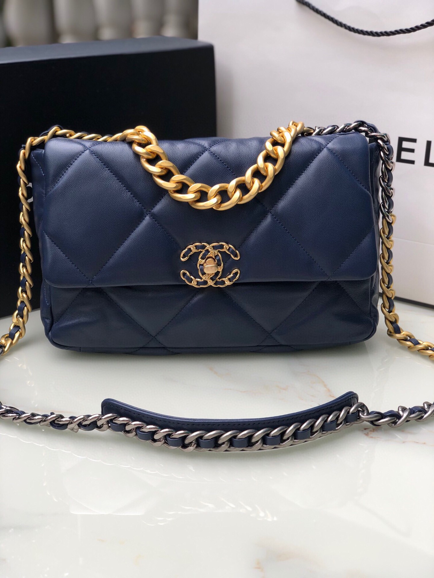 Ch*el 19 large handbag shiny leather, gold-tone, silver-tone & ruthenium-finish metal navy 7.8 × 11.7 × 3.9 in