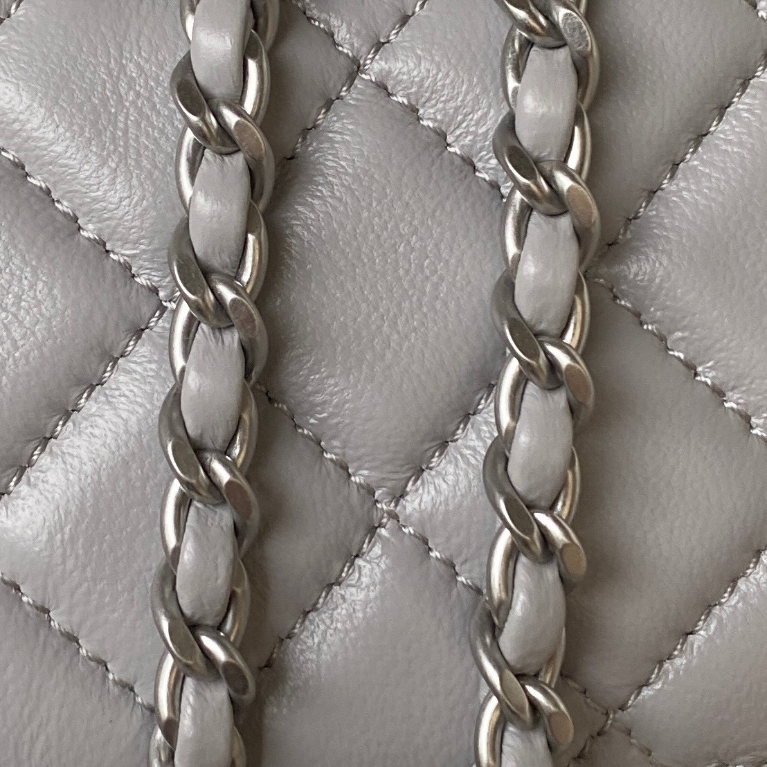 Ch*el mini flap bag shiny calfskin & silver-tone metal light gray 4.7 × 7.8 × 2.3 in