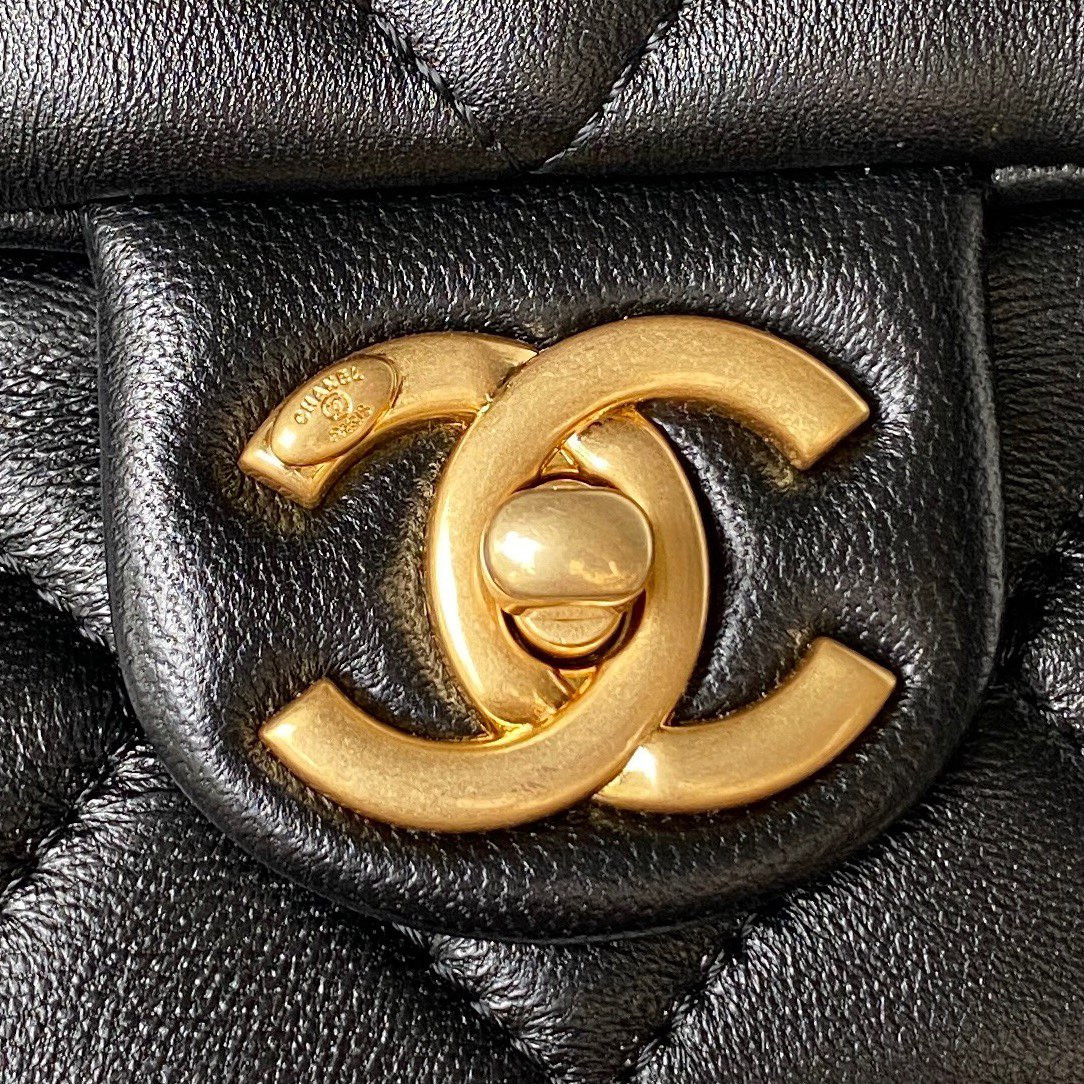 Ch*el small classic handbag grained shiny calfskin & gold-tone metal black 5.7 × 9 × 2.3 in