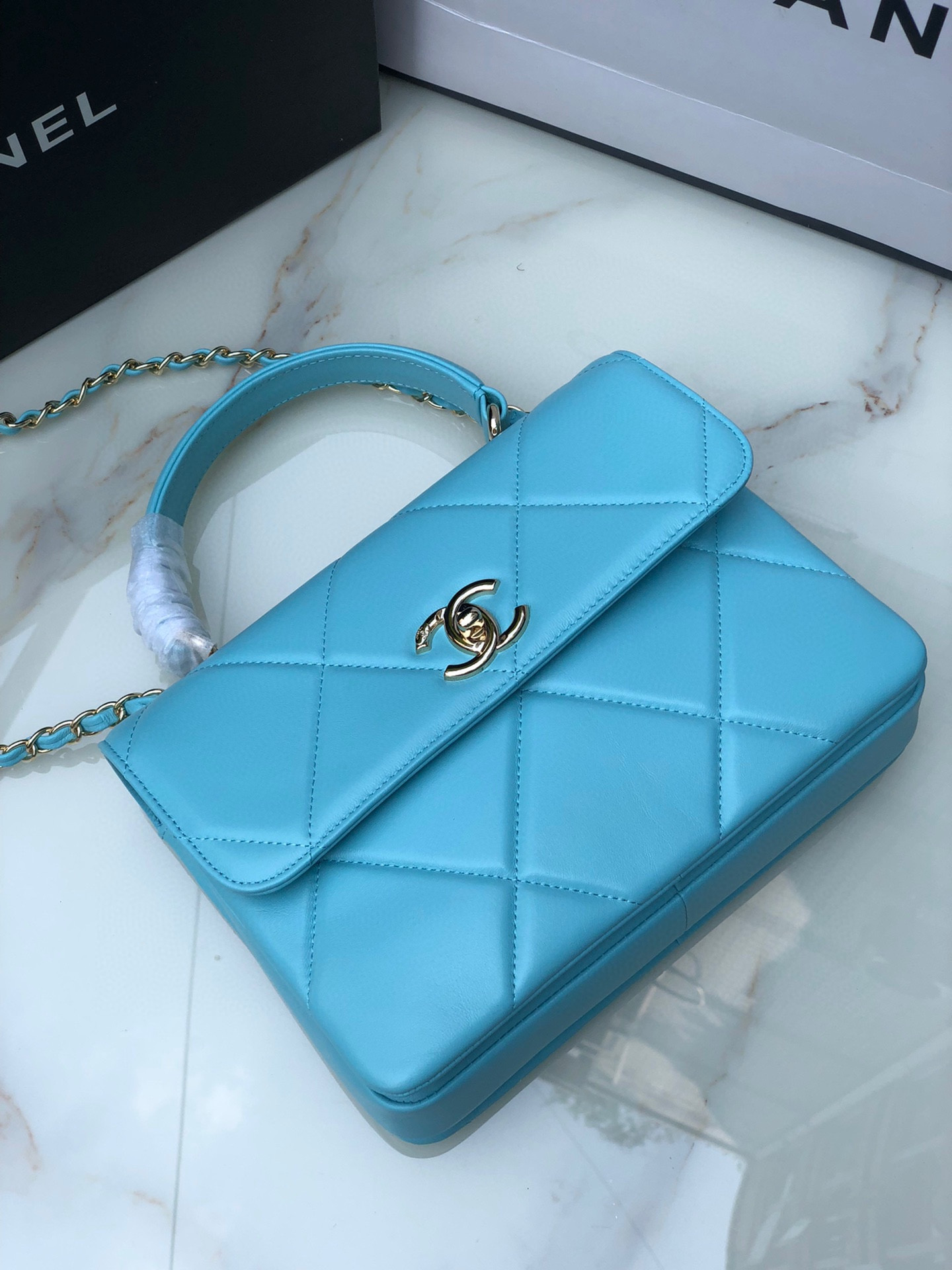 Ch*el flap bag with top handle 6.6 × 9.8 × 4.7 in