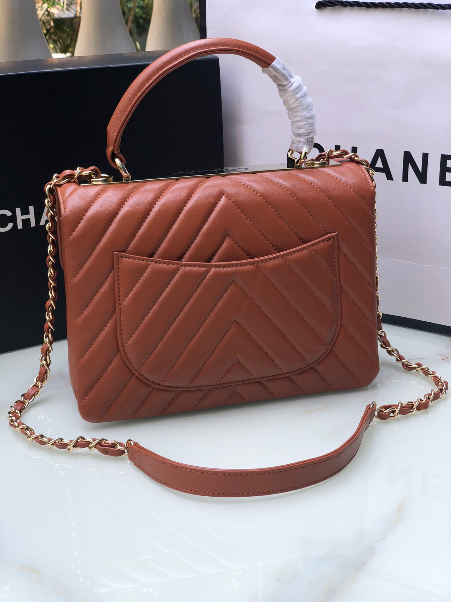 Ch*el flap bag with top handle orange 6.6 × 9.8 × 4.7 in