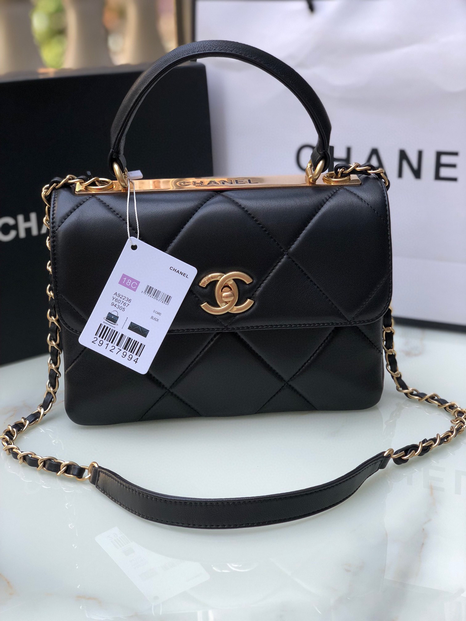 Ch*el flap bag with top handle 6.6 × 9.8 × 4.7 in