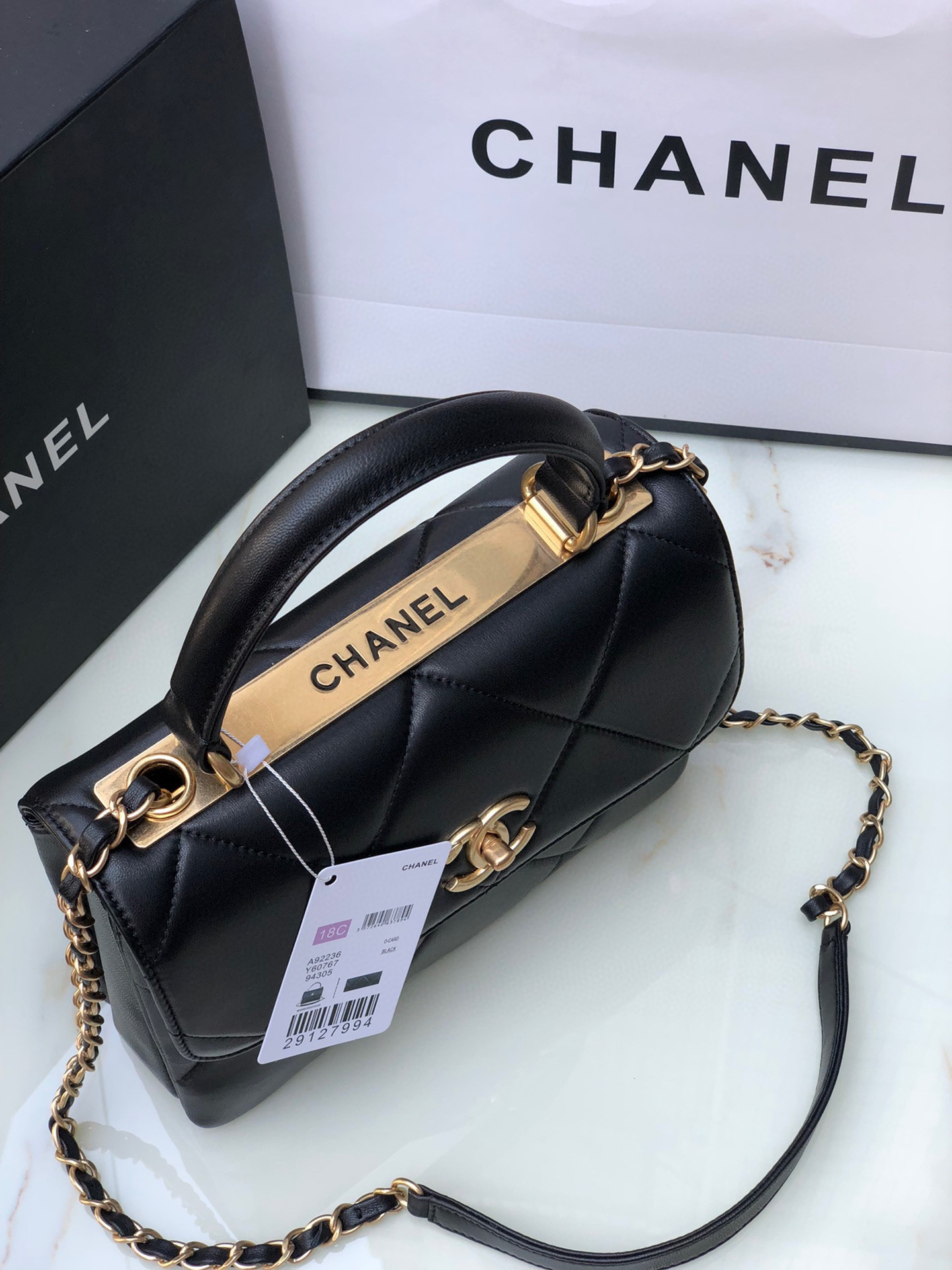Ch*el flap bag with top handle 6.6 × 9.8 × 4.7 in