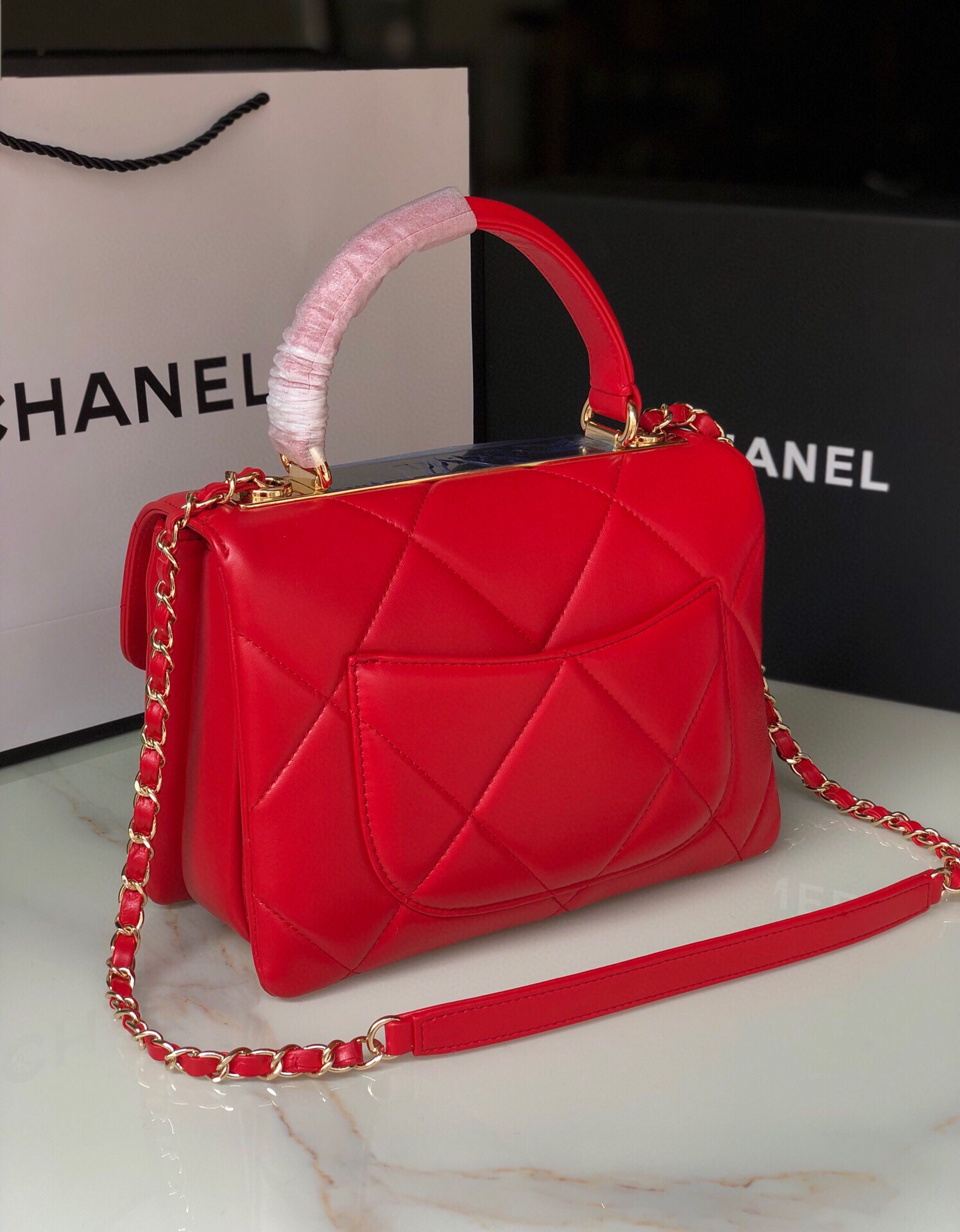 Ch*el flap bag with top handle 6.6 × 9.8 × 4.7 in