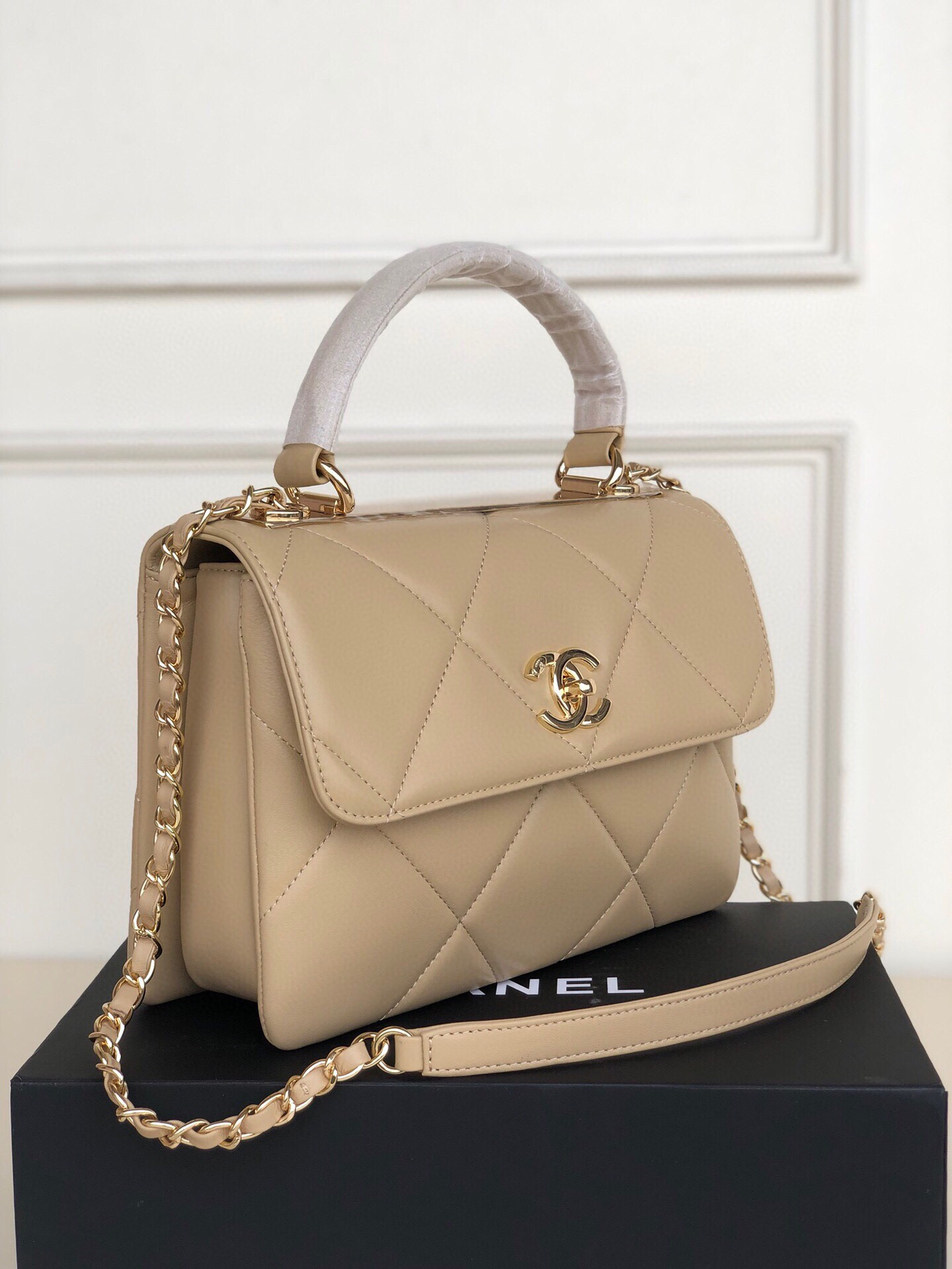 Ch*el flap bag with top handle 6.6 × 9.8 × 4.7 in