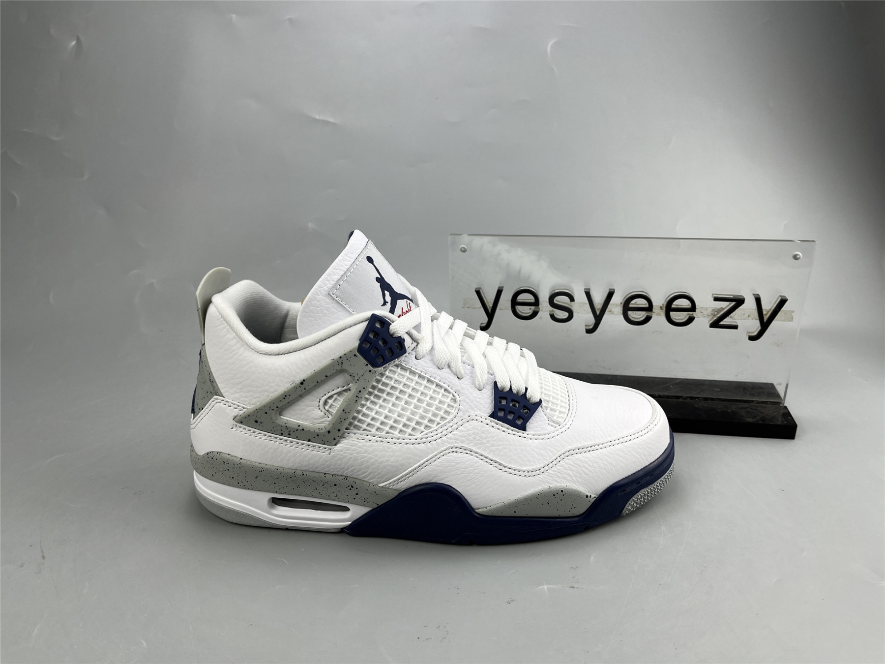 UA AIR JORDAN 4 RETRO 
