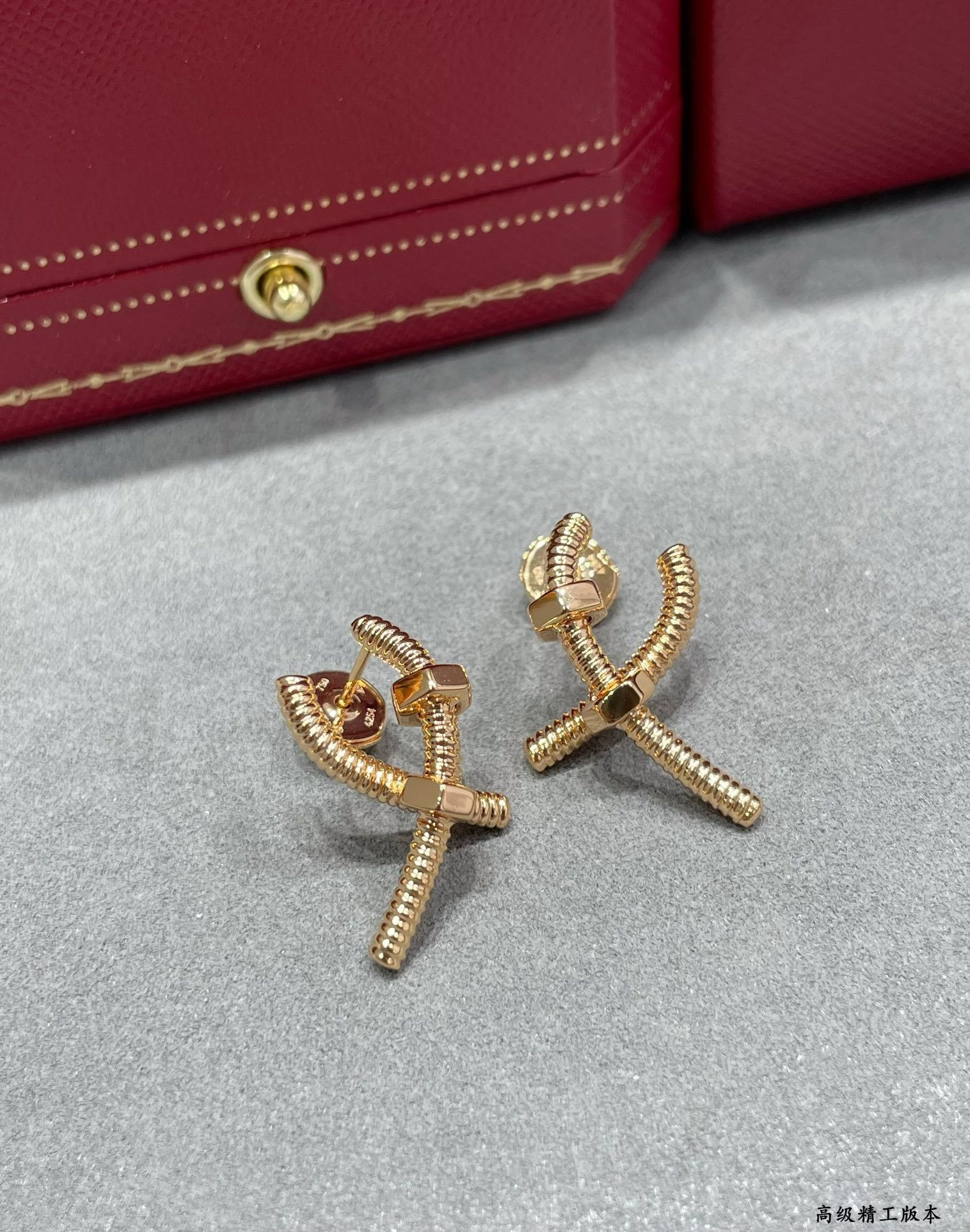 Ca*t1er Cross Screw Earrings