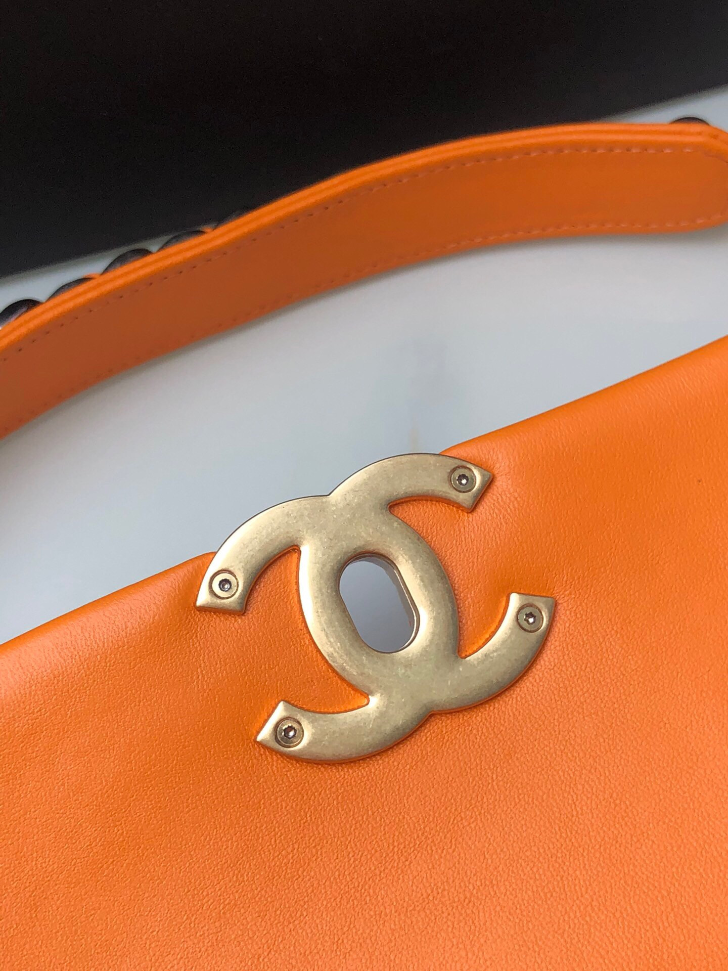 Ch**el 19 LARGE HANDBAG Shiny Leather, Gold-Tone, Silver-Tone & Ruthenium-Finish Metal Orange 7.8 × 11.7 × 3.9 in
