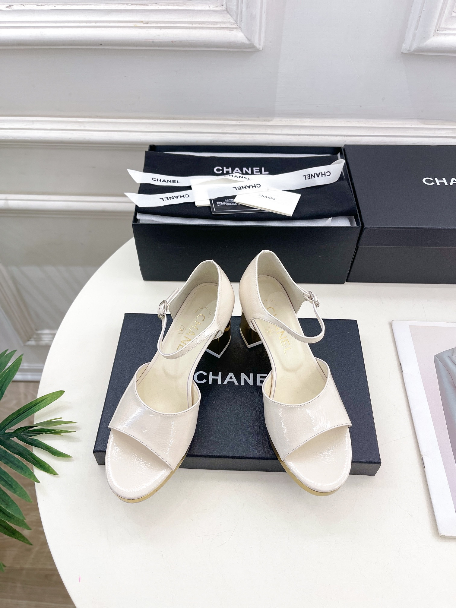 UA Ch**el HEELED SANDALS