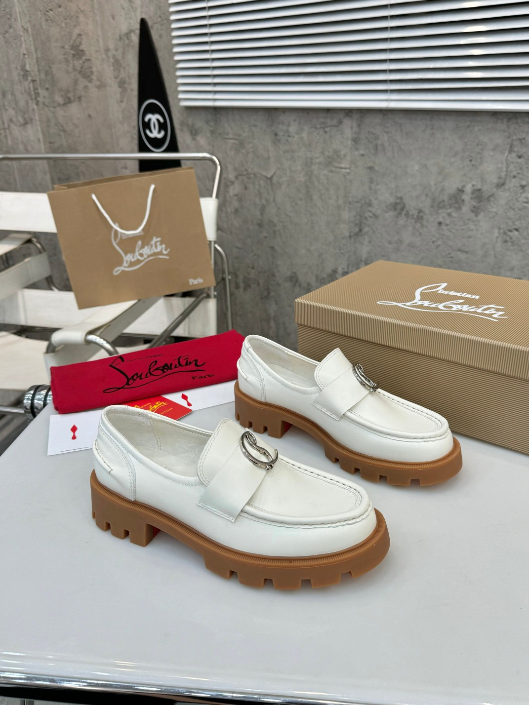 UA Chr1st1an Louboutin(CL) logo design,the latest runway version of the red-soled shoes